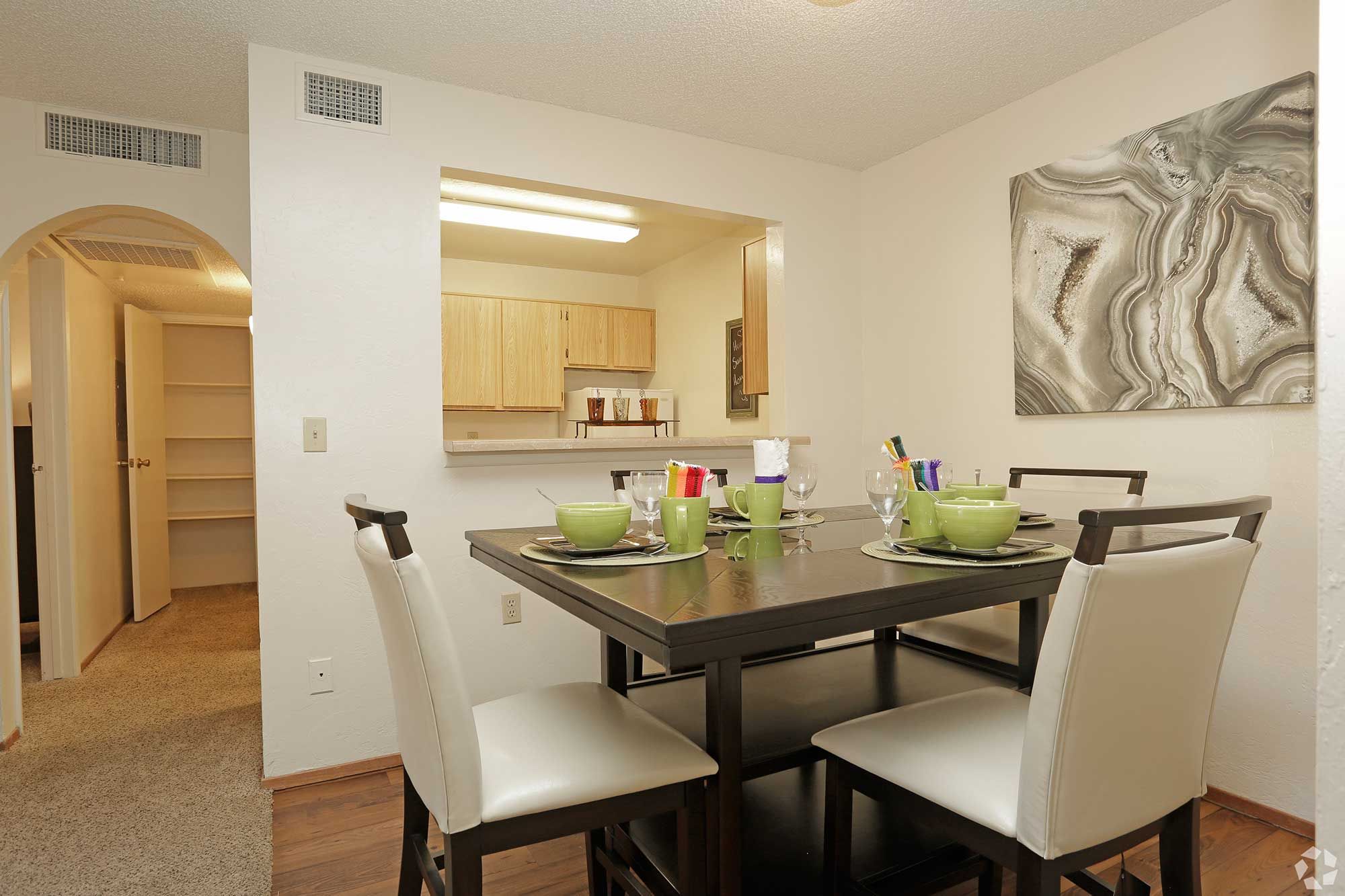 Silverado Apartments interior dining area with table in Tucson, Arizona